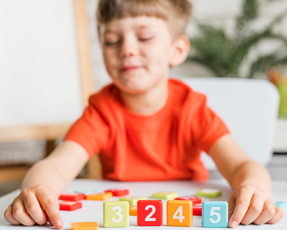 medium-shot-kid-playing-with-numbers